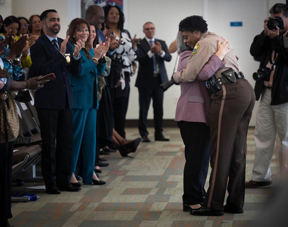 Miami-Dade Police Director Stephanie V. Daniels hugs Miami-Dade Mayor Mayor Daniella Levine Cava during Daniels’ investiture ceremony at Port Miami on Wednesday, Jan. 10, 2024.