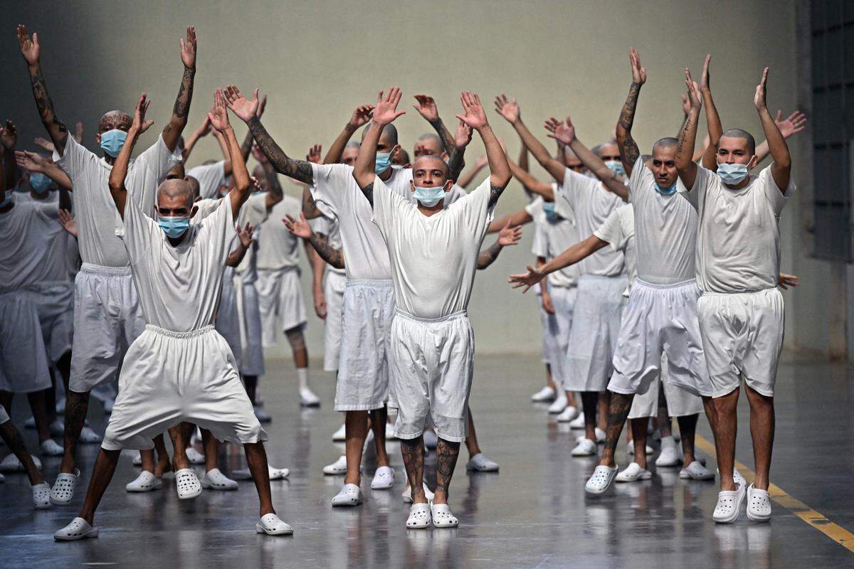 This photo, released by the Presidencia El Salvador, shows a second group of 2,000 detainees being transferred overnight to the Terrorist Confinement Centre (CECOT) in Tecoluca, El Salvador, on March 15, 2023.