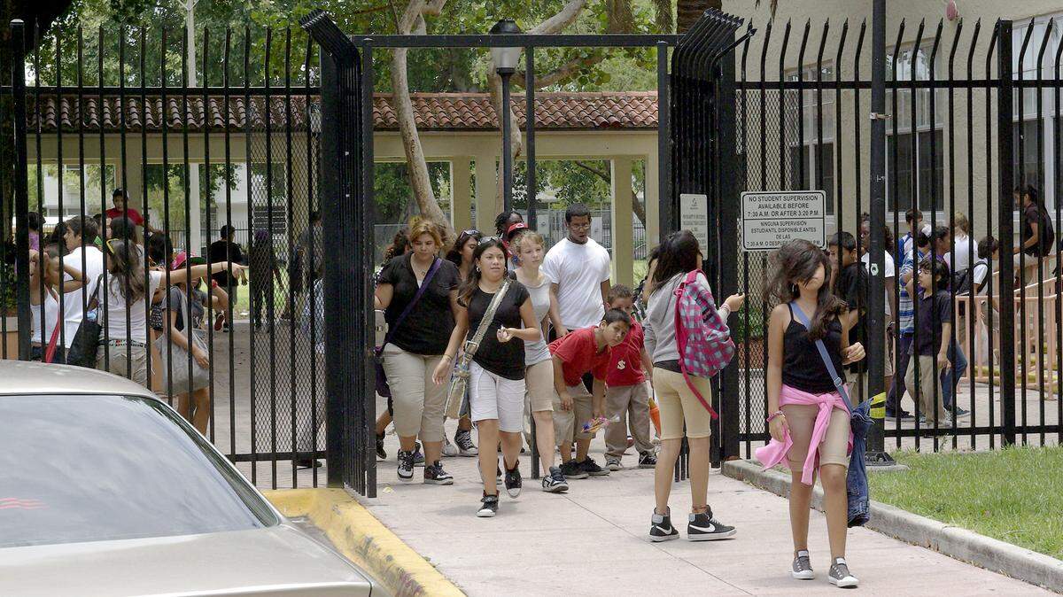 Students leave for the summer on the last day of the 2010-2011 school year at Fienberg-Fisher K-8 Center in Miami Beach.