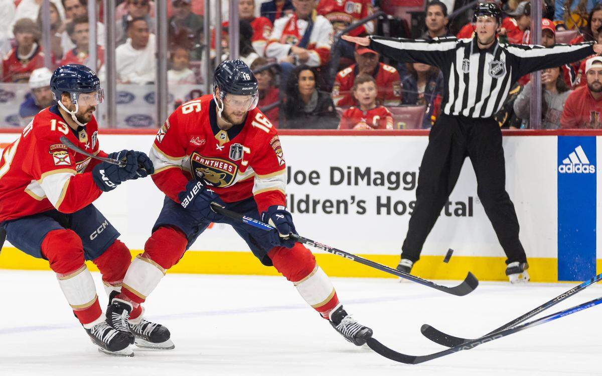 Florida Panthers center Aleksander Barkov (16) tries to control the puck as he plays against the Edmonton Oilers in the first period of Game 2 of the NHL Stanley Cup Finals at the Amerant Bank Arena on Monday, June 10, 2024, in Sunrise, Fla.