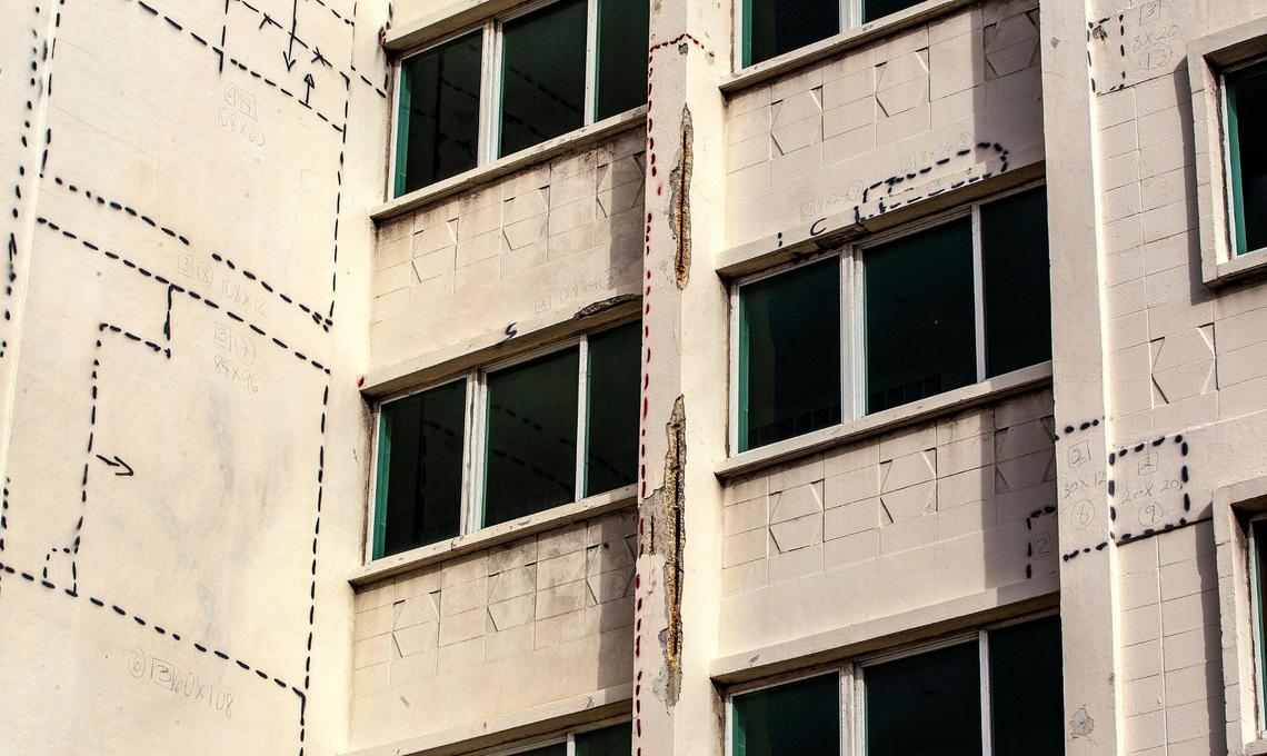 Detail of concrete damage on exterior walls at the La Costa condominium, located at 5333 Collins Ave., Miami Beach, on Wednesday, Sept. 1, 2021. The condo building has been vacated of all residents by the city because of structural and other problems; a developer has bought most of the units and plans to demolish it.