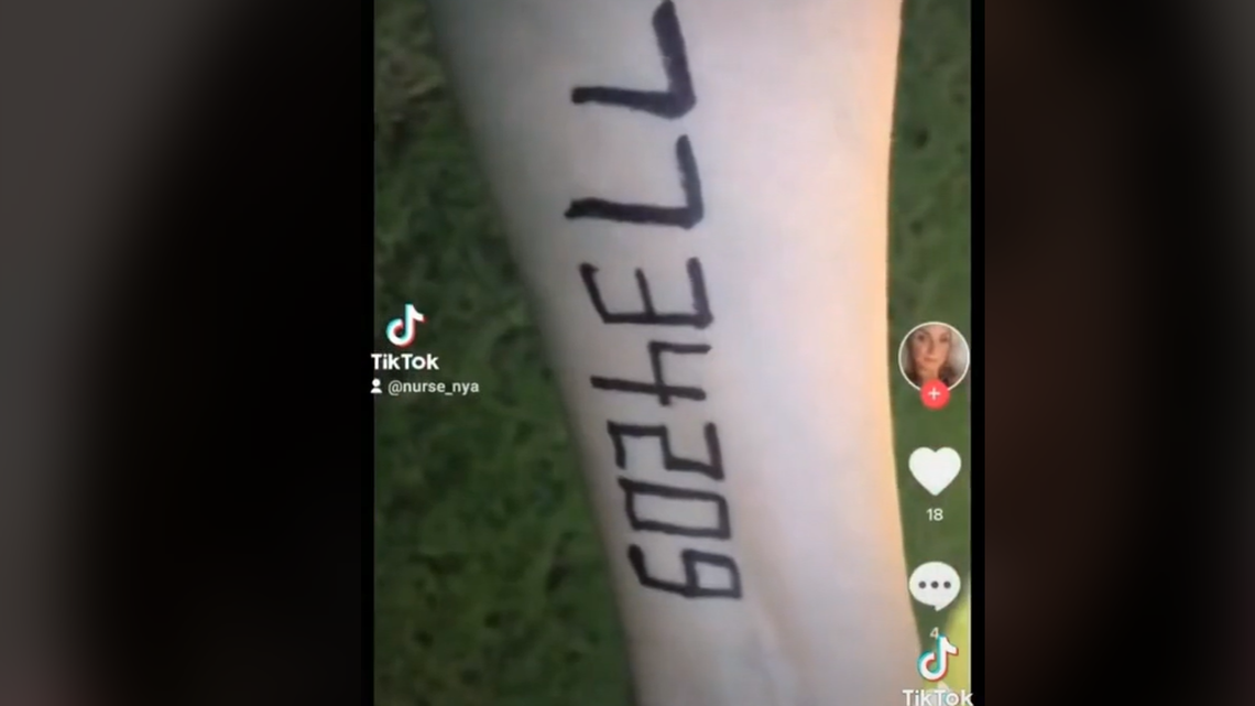 Jessica Renzi, a former employee of Wellstar Health System in Atlanta, Georgia, “is no longer employed” after posting a video on TikTok likening a COVID-19 vaccine to the Holocaust. The photo is a screengrab from TikTok user “auntkaren0’s” video.