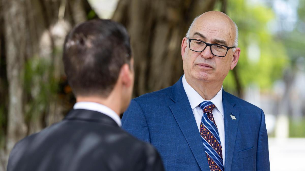 City of Miami mayoral candidate Emilio González leaves after speaking during a press conference outside of his home on Wednesday, July 16, 2025, in Miami. González, who was a former city manager, has sued the city over its decision to move the upcoming November election to 2026 without voter approval.