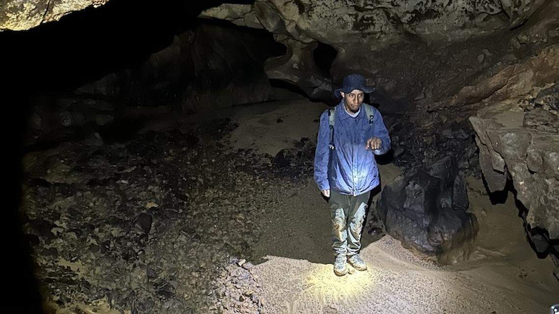 A young cave guide and a cave researcher on a mapping project discovered ancient artifacts in a hidden room, archaeologists said.