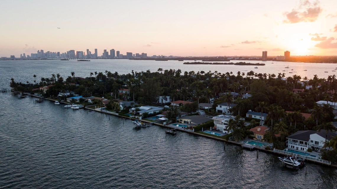 Home prices in Miami-Dade and Broward counties rose by double digits over the past year, despite steadily increasing interest rates on mortgages. Above is an aerial view of residences in North Bay Village near Miami Beach.