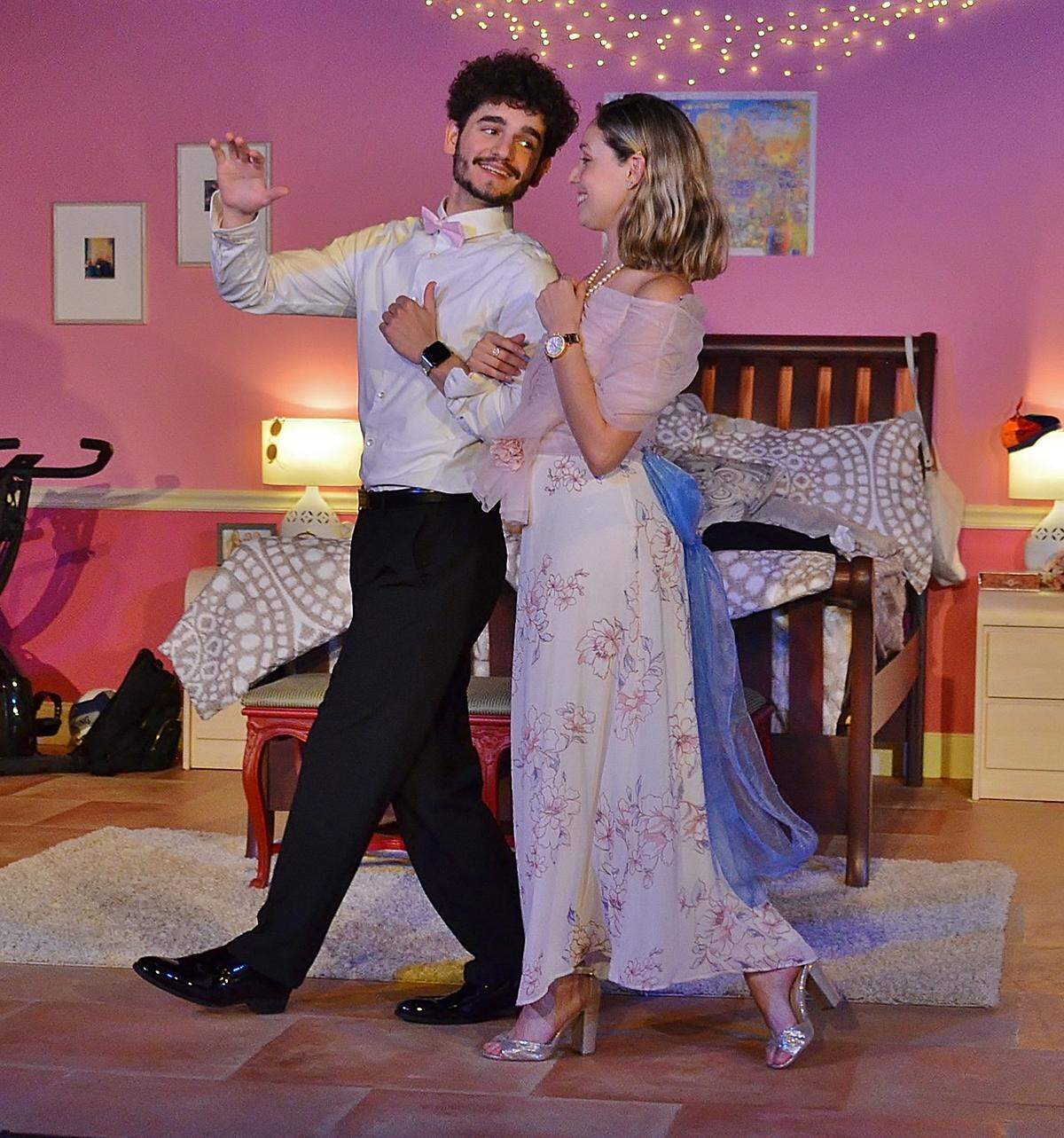 Groomsman Kevin Rubi connects with bridesmaid Amanda-Lynn Williams in “Five Women Wearing the Same Dress” at Main Street Playhouse.