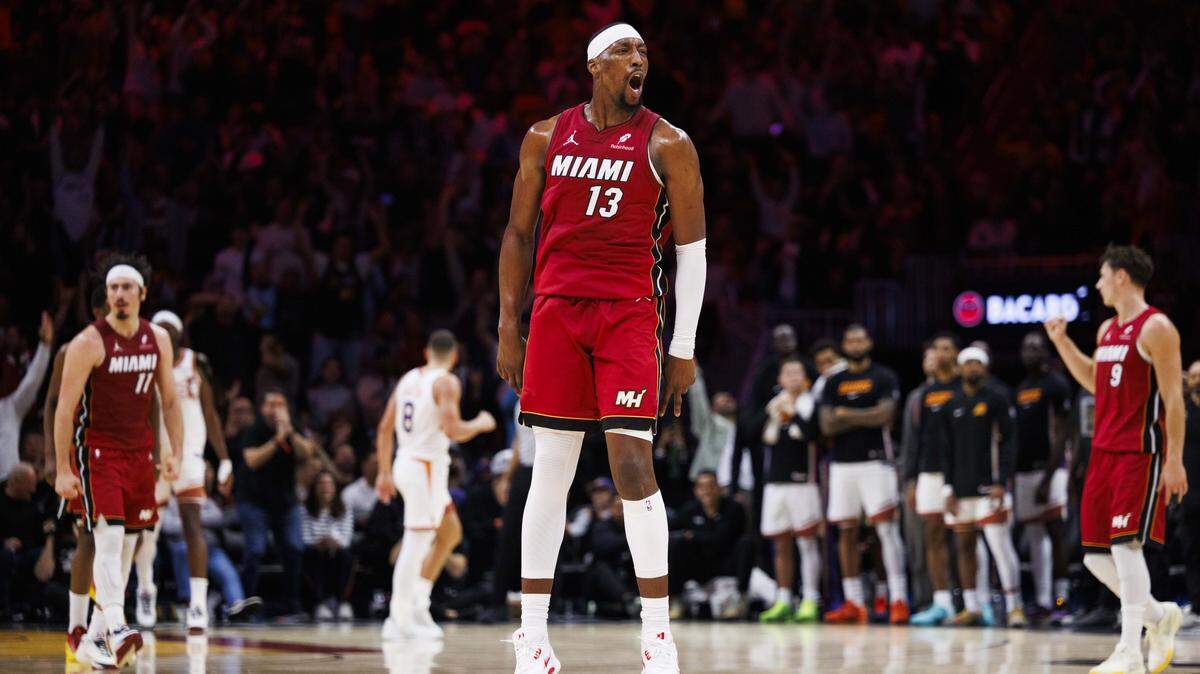 Miami Heat center Bam Adebayo (13) reacts after making a basket during the second half of a game against the Phoenix Suns on Tuesday, Jan. 13, 2026, at the Kaseya Center in downtown Miami, Fla. 