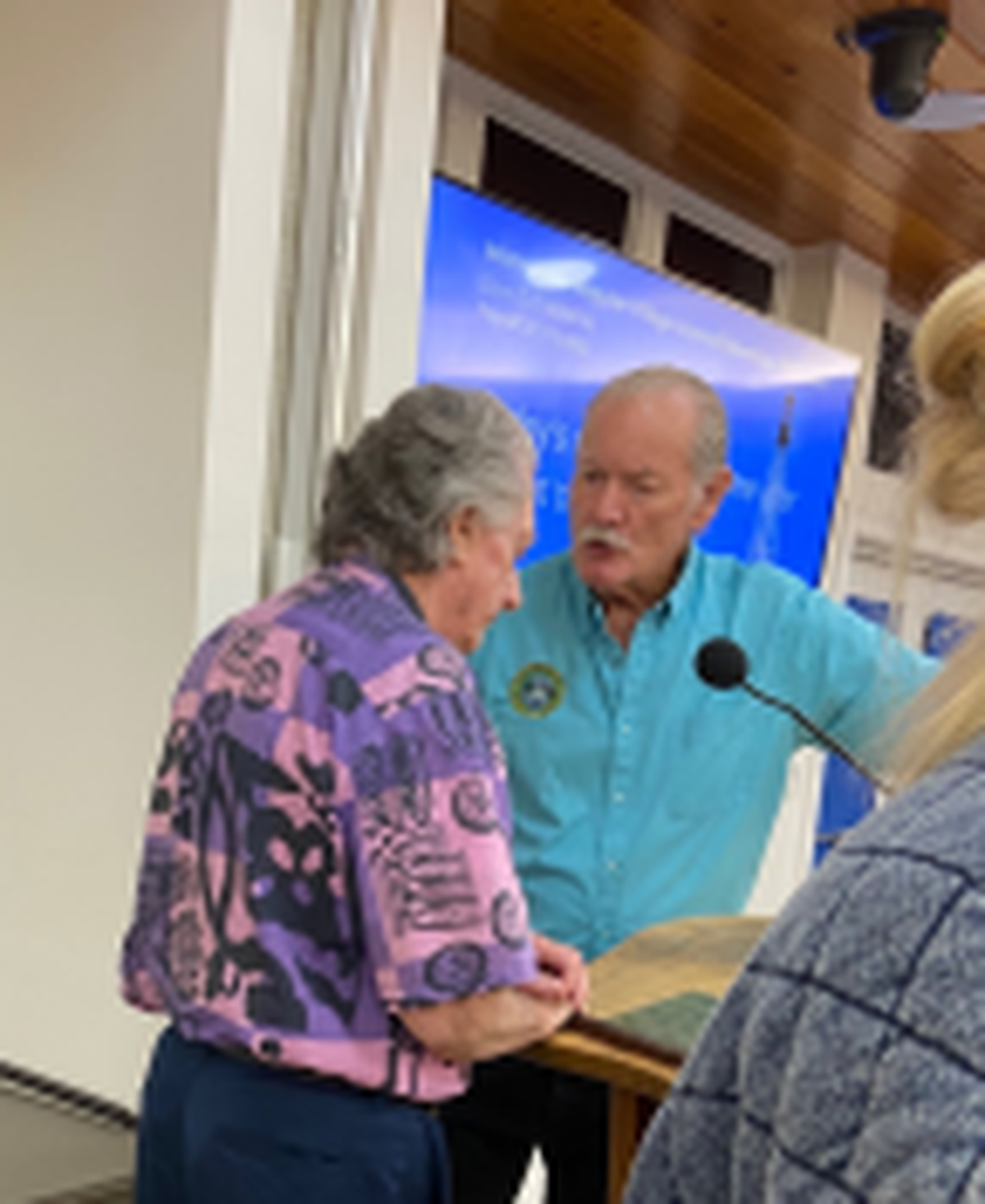 Islamorada Village Councilman David Webb speaks to Vice Mayor Henry Rosenthal while on break during a Thursday, Aug. 25, 2022, meeting where a vote was taken to increase annual garbage collection assessments.