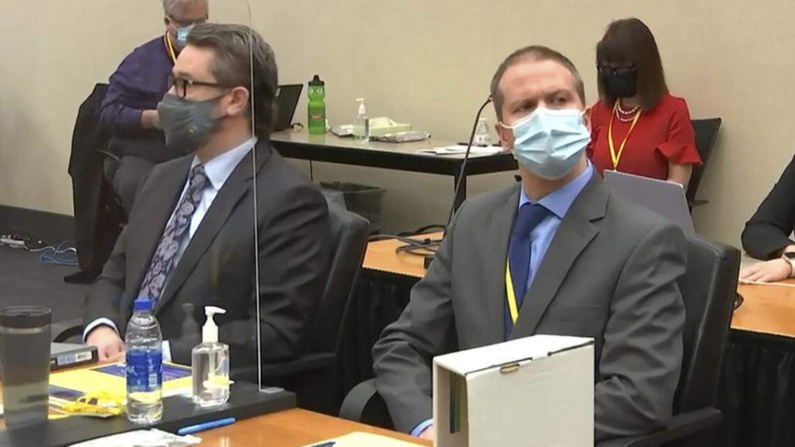 Former Minneapolis police officer Derek Chauvin, right, is on trial in the death of George Floyd.