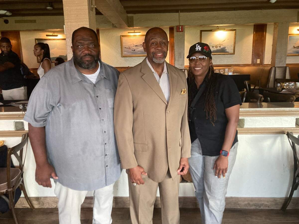 Former Miami Norland athletic director Ira Fluitt (middle), seen here with Vikings boys’ basketball coach Lawton Williams III (left) and former girls’ basketball coach Carla Harris (right) was honored at a recent ceremony at 94th Aero Squadron in Miami.