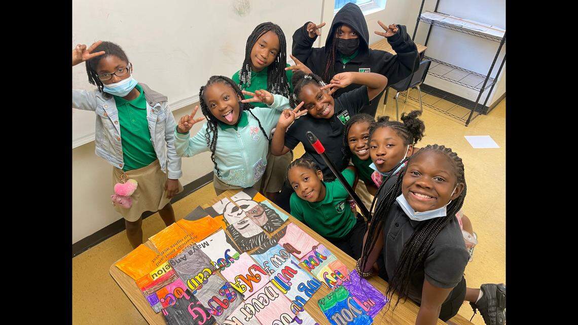 Girls from the Miami chapter of Girls Inc. put together a poster with a Maya Angelou quotation at Beacon College Prep in Opa-locka on Oct. 6, 2022. As part of the exercise, the team leaders discussed how each girl is unique. The full quote from Angelou was: ‘If you are always trying to be normal, you will never know how amazing you can be.’