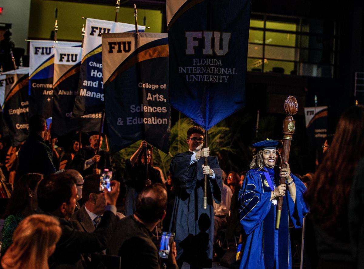 Florida International University Faculty Senate chair Deanne Butchey leads the opening procession of the FIU presidential investiture ceremony, where Kenneth Jessell was sworn in as FIU’s sixth president, Thursday May 18 , 2023.