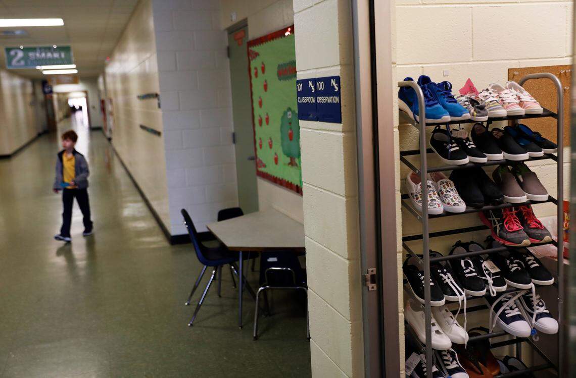 A broom closet in Northside Elementary School is shown on Jan. 24, 2019, filled with donated shoes for students whose homes were destroyed by Hurricane Michael in Panama City. With 4,700 students among the homeless since the hurricane, principals and teachers at Bay County schools are on the lookout for students who are wearing dirty clothes or missing shoes. Northside Elementary was given industrial washers and dryers so students can get their clothes cleaned.