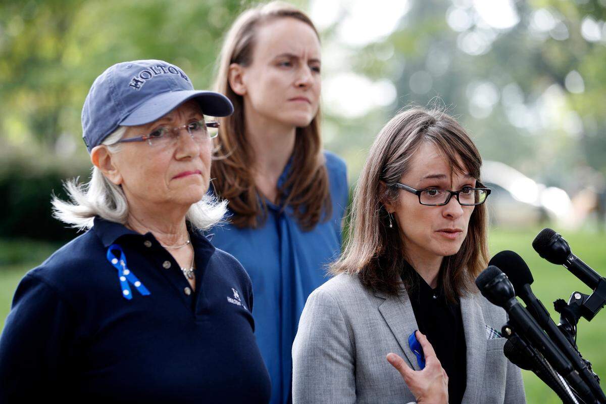 Alumni of Holton-Arms School, Karen Bralove, class of 1963, left, Sarah Burgess, class of 2005, and Alexis Goldstein, class of 1999, speak to members of the media about a letter they delivered to the office of Sen. Shelley Moore Capito, R-W.Va., who is also an alumni of the school, Thursday, Sept. 20, 2018, on Capitol Hill in Washington. The letter, which the group wants Capito to sign, calls for an independent investigation of accusations by Christine Blasey Ford, a 1984 alumni of the school, against Supreme Court nominee Brett Kavanaugh.