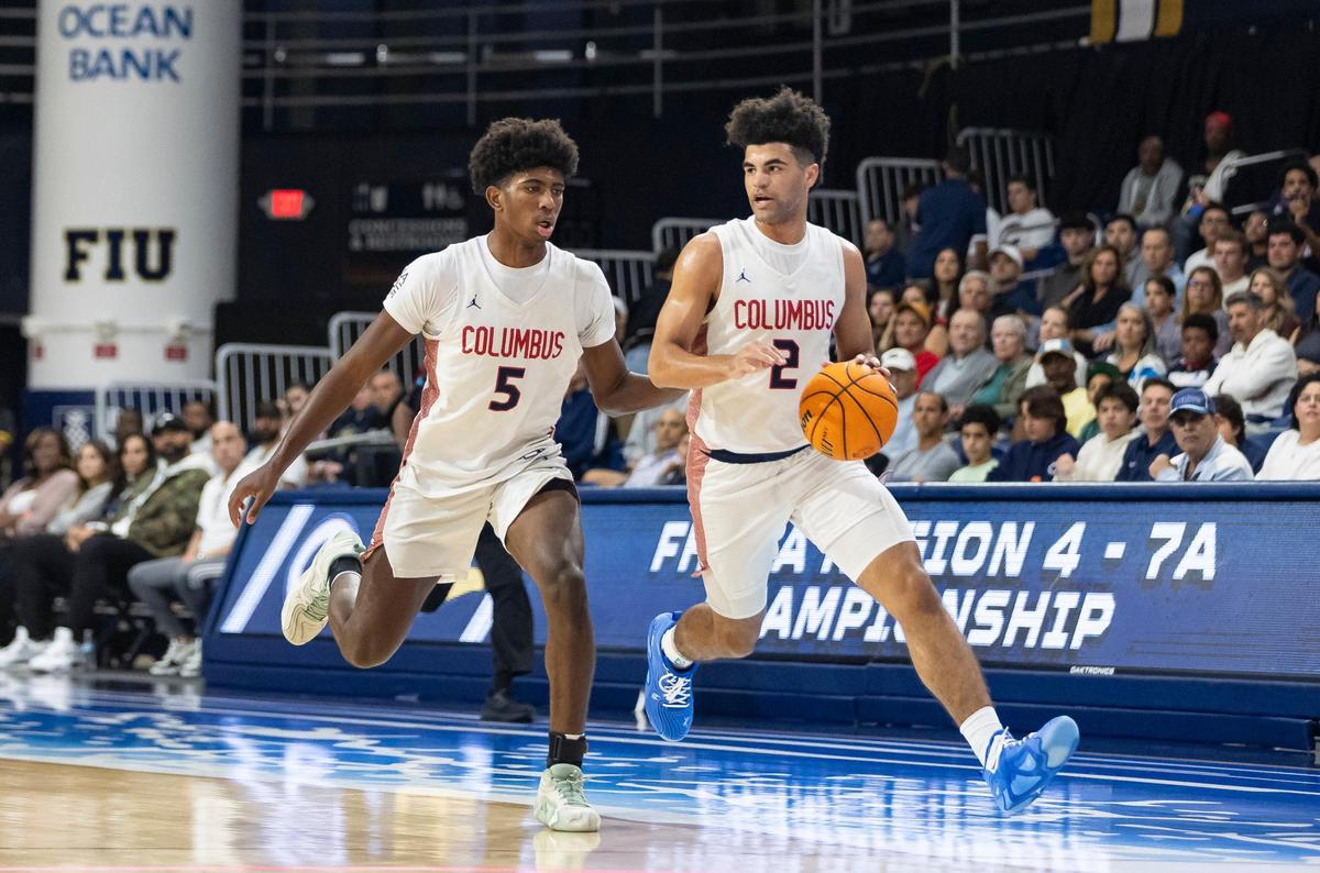 Columbus Explorers Jaxon Richardson (5) and Cayden Boozer (2) drive the ball down the court against the Miami Stingarees in the first half of their Region 4-7A championship basketball game final at the Ocean Bank Convocation Center on Thursday, Feb. 20, 2025, in Miami, Fla.