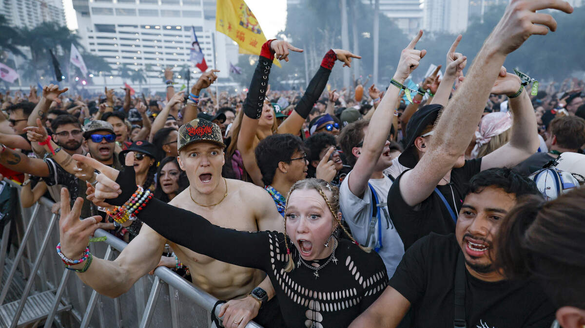 Ultra attendees react during the performance by Illenium at the Main Stage at Ultra Music Festival in Miami, Florida, on Friday, March 27, 2026.