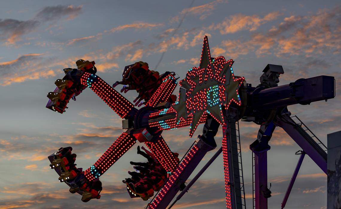 Guests ride the Star Dancer attraction during the opening day of the 74th annual Miami-Dade County Youth Fair on Thursday, March 12, 2026, in Miami, Fla.
