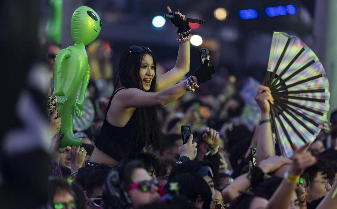 People dance and cheer as Excision performs during Ultra Music Festival’s 26th anniversary at Bayfront Park on Saturday, March 28, 2026, in downtown Miami, Fla.
