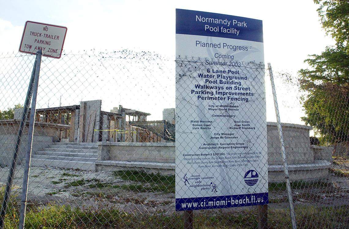 Sign in front of an under-construction municipal pool that says it will be finished in 2003 at 7030 Trouville Esplanade in Normandy Isle.