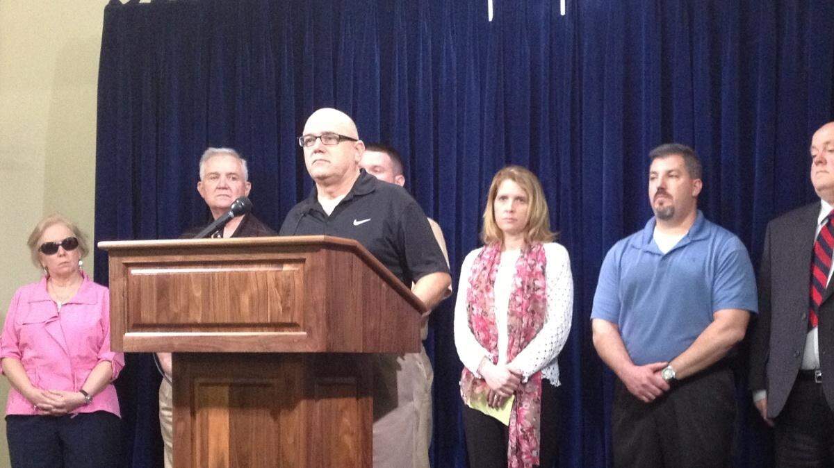 Victims of the USS Cole attacks speak to the media at the U.S. Navy base at Guantanamo on Feb. 5, 2013.