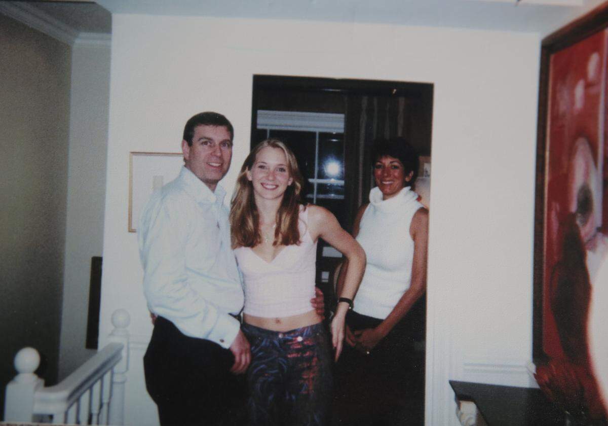 Virginia Giuffre — then Virginia Roberts — socializes with Prince Andrew as Jeffrey Epstein associate Ghislaine Maxwell stands in the background.