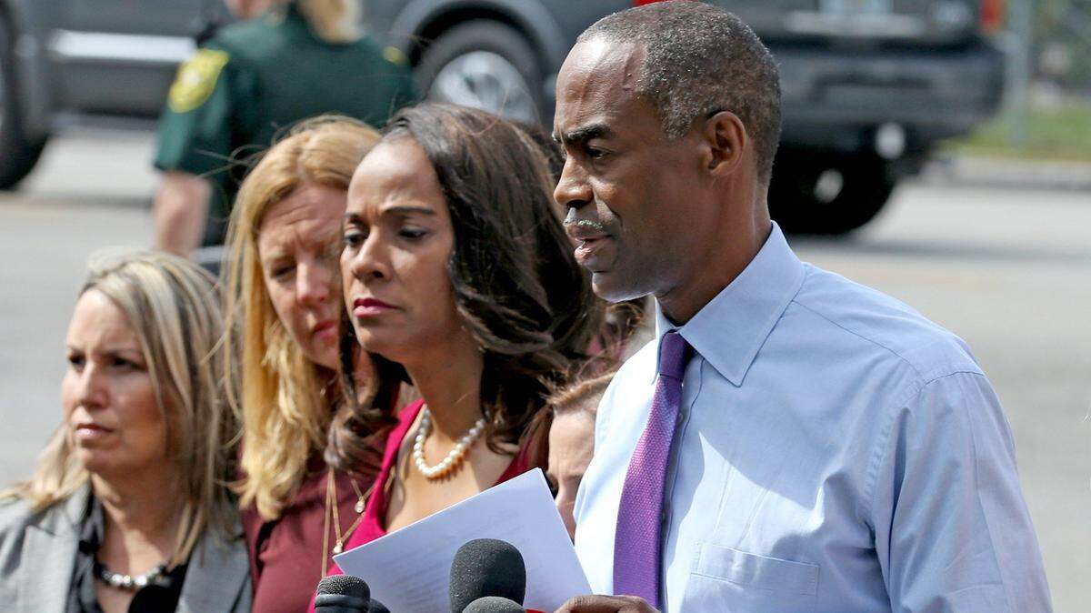 Broward County School Superintendent Robert Runcie talks to reporters at Marjory Stoneman Douglas High School, February 23, 2018, as teachers and staff returned to the school.