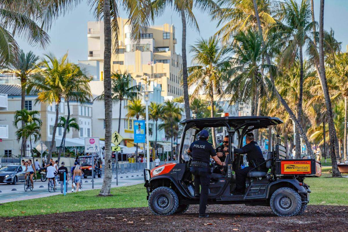 Miami Beach Police Officers on watch along Ocean Drive during Spring Break 2025 on Miami Beach,