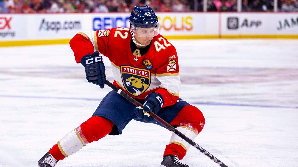 Florida Panthers defender Gustav Forsling (42) controls the puck during the second period of an NHL game against the Tampa bay Lightning at FLA Live Arena in Sunrise, Florida, on Friday, October 21, 2022.
