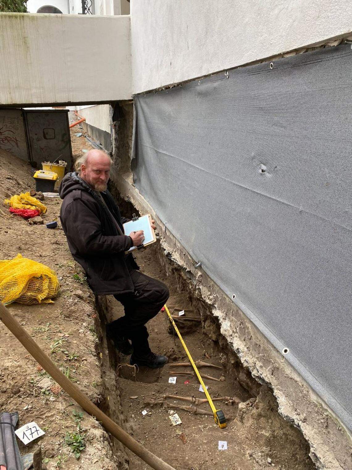 Experts discovered 18 complete or partially complete skeletons as well as scattered human bones.