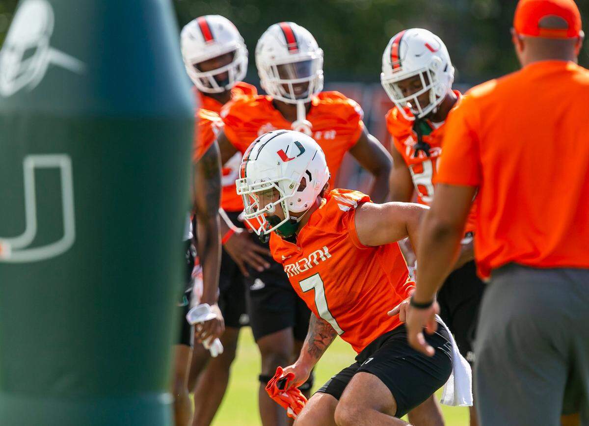 Miami Hurricanes wide receiver Xavier Restrepo (7) runs practice drills with his team at the University of Miamis Greentree Practice Fields in Coral Gables, Florida on Monday, March 7, 2022.