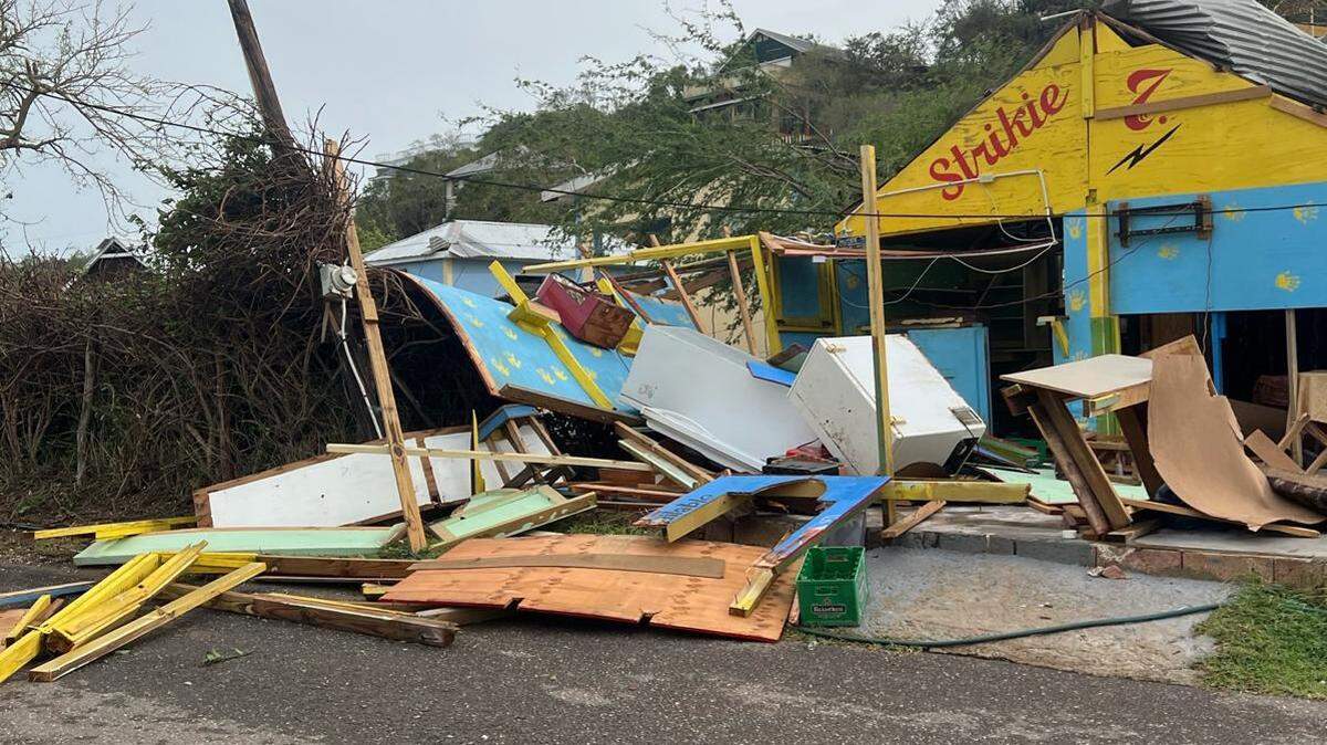 Hurricane Beryl tore off roofs and destroyed homes in Treasure Beach, a small fishing and tourism community off the southern coast of Jamaica. Residents assessed the damage on July 4, 2024.