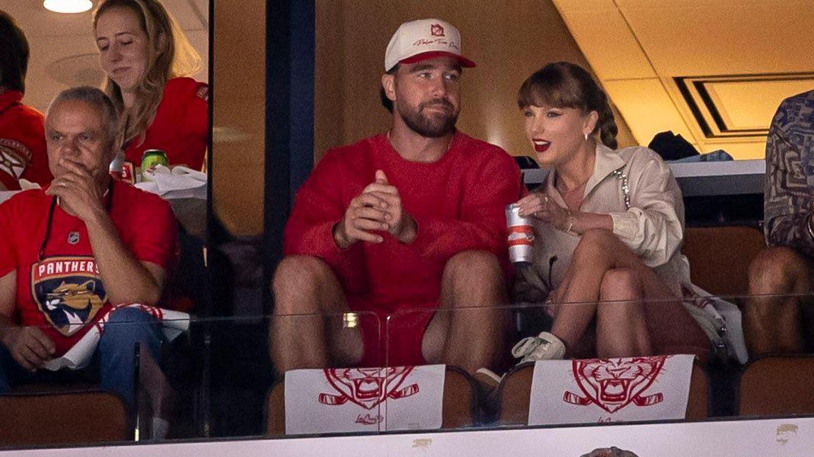 Travis Kelce and Taylor Swift enjoy the game between the Panthers and the Oilers during the first period of Game 4 in the NHL Stanley Cup Final series at Amerant Bank Arena on Thursday, June 12, 2025, in Sunrise, Fla.