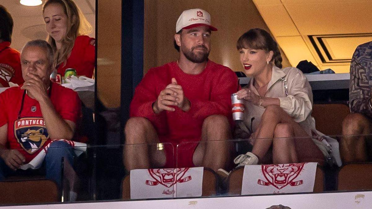 Travis Kelce and Taylor Swift enjoy the game between the Panthers and the Oilers during the first period of Game 4 in the NHL Stanley Cup Final series at Amerant Bank Arena on Thursday, June 12, 2025, in Sunrise, Fla.