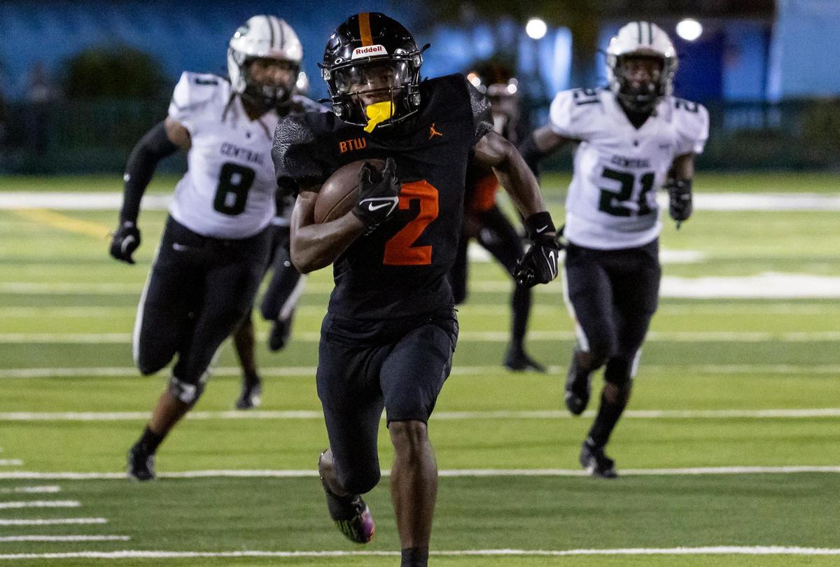 Booker T. Washington Tornadoes wide receiver Elliah Henton (2) runs with the ball during the second quarter of his high school football game against the Central Rockets at the Nathaniel Traz Powell Stadium on Friday, Sept. 8, 2023, in Miami, Fla.