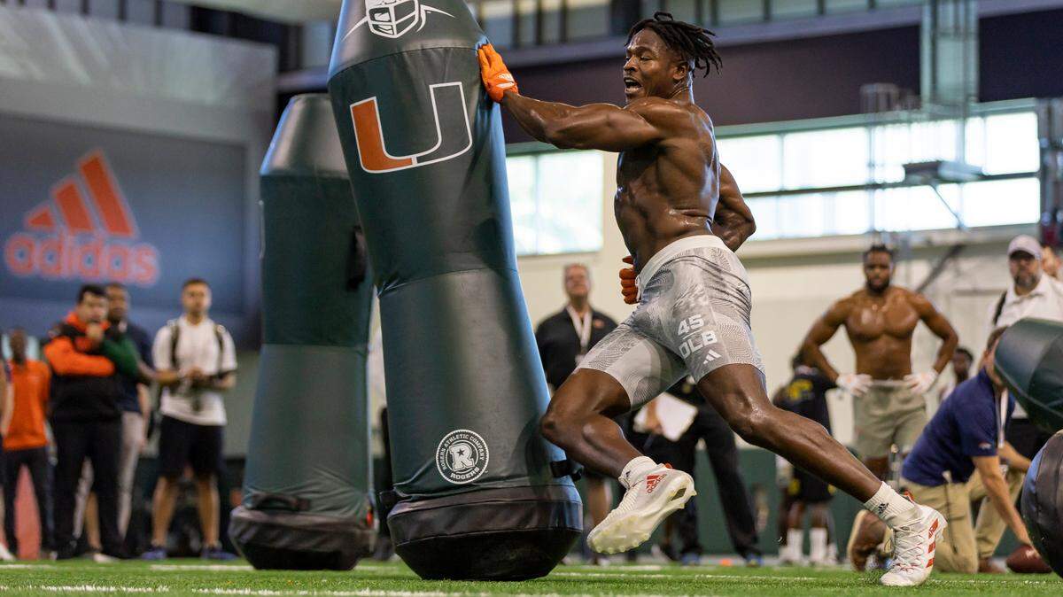Defensive lineman Mitchell Agude runs drills during Football Pro Day at the University of Miami’s indoor practice facility on Monday, March 27, 2023 in Coral Gables, Fla.