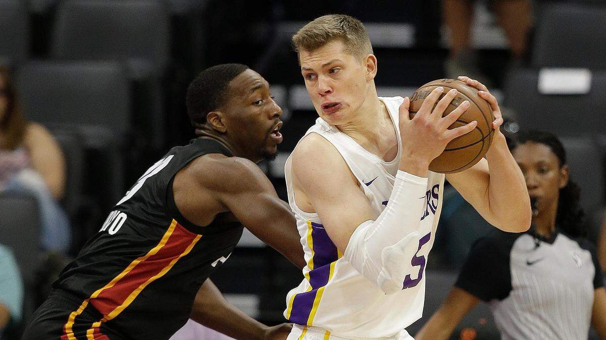 Miami Heat center Bam Adebayo, left, guards Los Angeles Lakers center Moritz Wagner during the first half of an NBA summer league basketball game Tuesday, July 3, 2018, in Sacramento, Calif. (AP Photo/Rich Pedroncelli)
