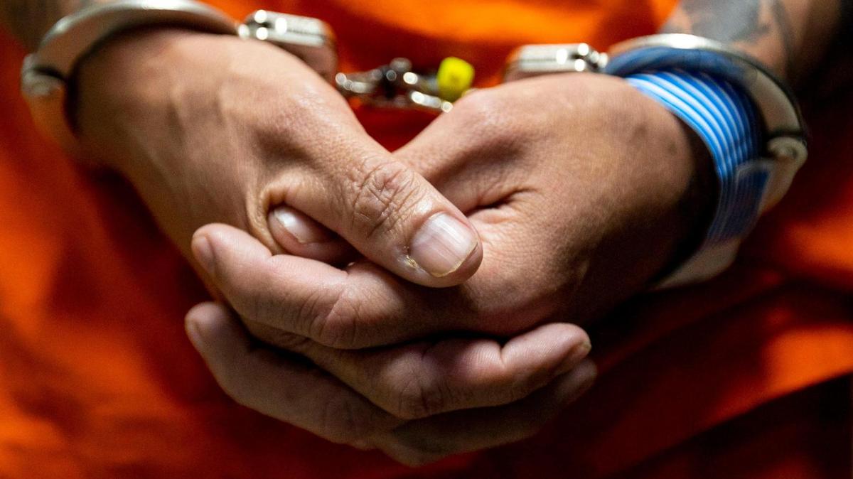 A shackled inmate has his first-appearance hearing at Turner Guilford Knight Correctional Center in Miami — a step in a flawed bail process that Miami-Dade is preparing to overhaul. There also are questions about the new plan, based in part on software designed to predict whether people will return to criminal behavior.