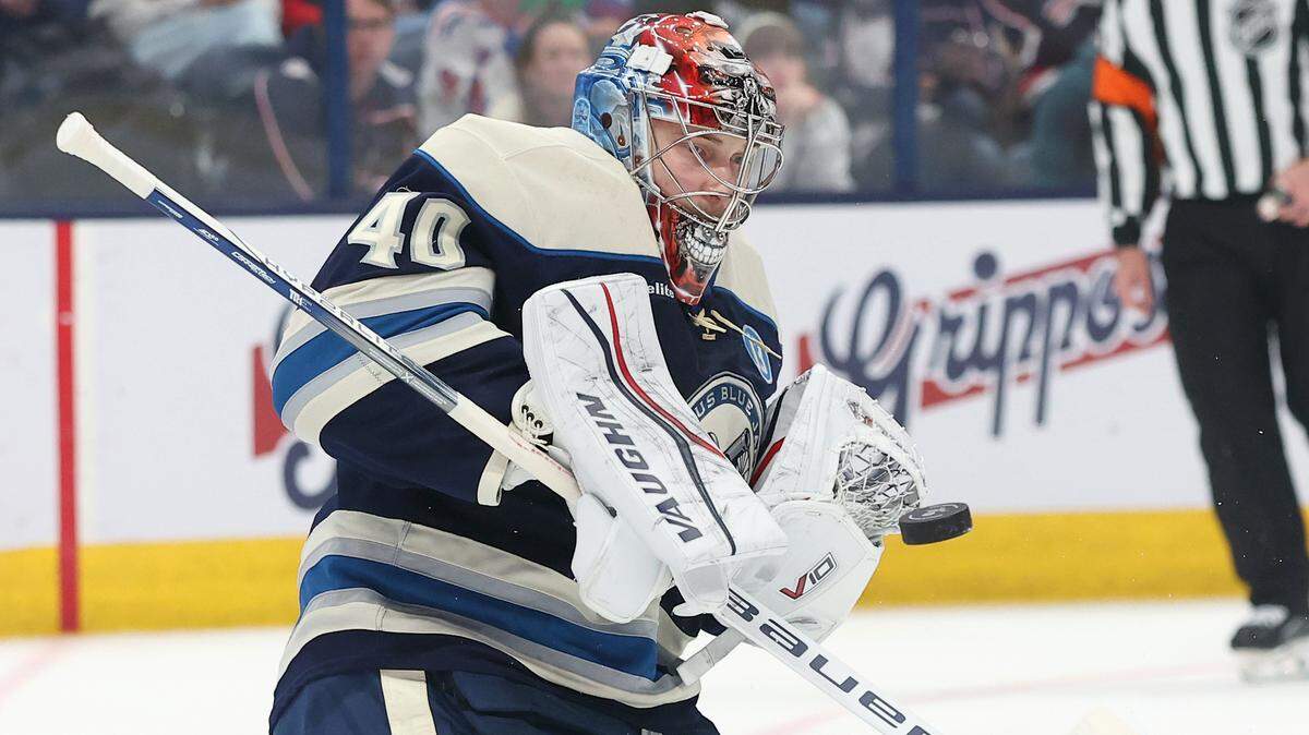 Mar 15, 2025; Columbus, Ohio, USA;  Columbus Blue Jackets goaltender Daniil Tarasov (40) saves the puck with during the first period against the New York Rangers at Nationwide Arena. Mandatory Credit: Joseph Maiorana-Imagn Images