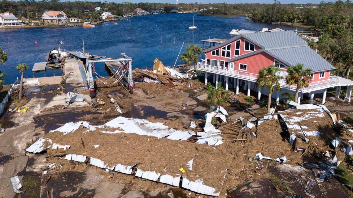 Homes, docks and boats sit damaged by Hurricane Helene on September 27, 2024 in Steinhatchee, Florida.