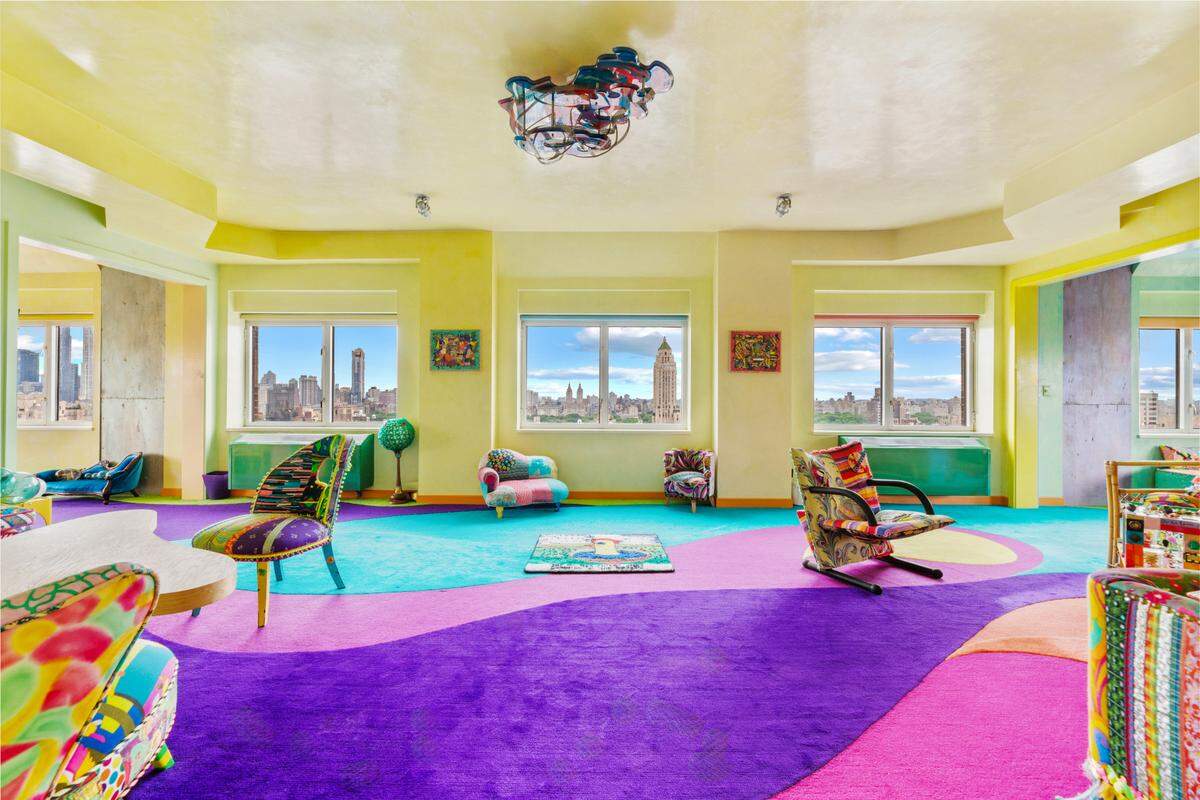 The living room with one direction of the home’s 360° views of New York City.