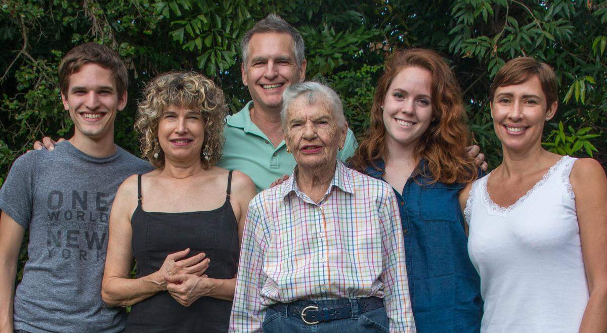 A Jean Pugh family portrait featuring from left to right: grandson Grant, daughter Carla, son Carl, Jean Pugh, granddaughter Jennifer and daughter-in-law Monica.