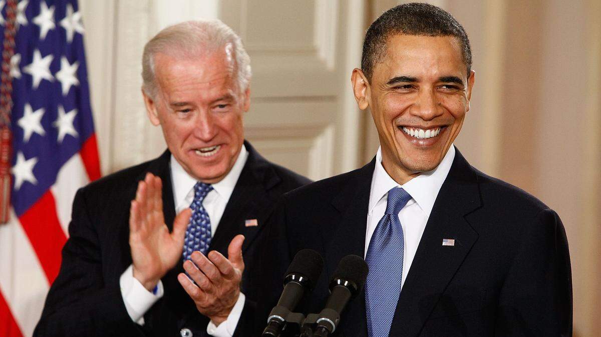 At the 2010, Vice President Biden and President Obama celebrate at the signing ceremony for the Affordable Care Act.