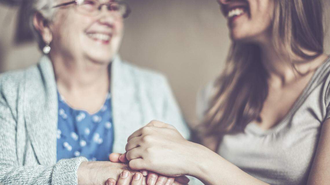 Social worker is visiting a senior woman in her own apartment.