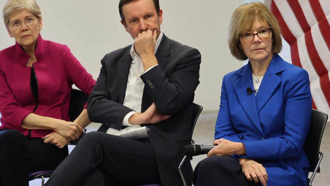 Three Senate Democrats - Elizabeth Warren of Massachusetts, Chris Murphy of Connecticut, and Tina Smith of Minnesota, right, listen closely while engaging in discussions with those directly affected by the impending expiration of tax credits on Monday, November 3, 2025 at the SEIU Local 1991 in Miami, Florida. 