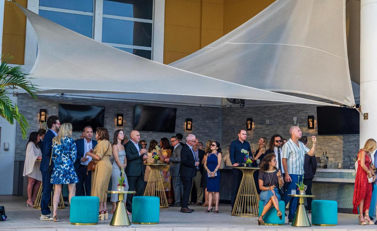 Guests mingle under a tent at The Mandarin Oriental, Miami on Thursday May 15, 2025.