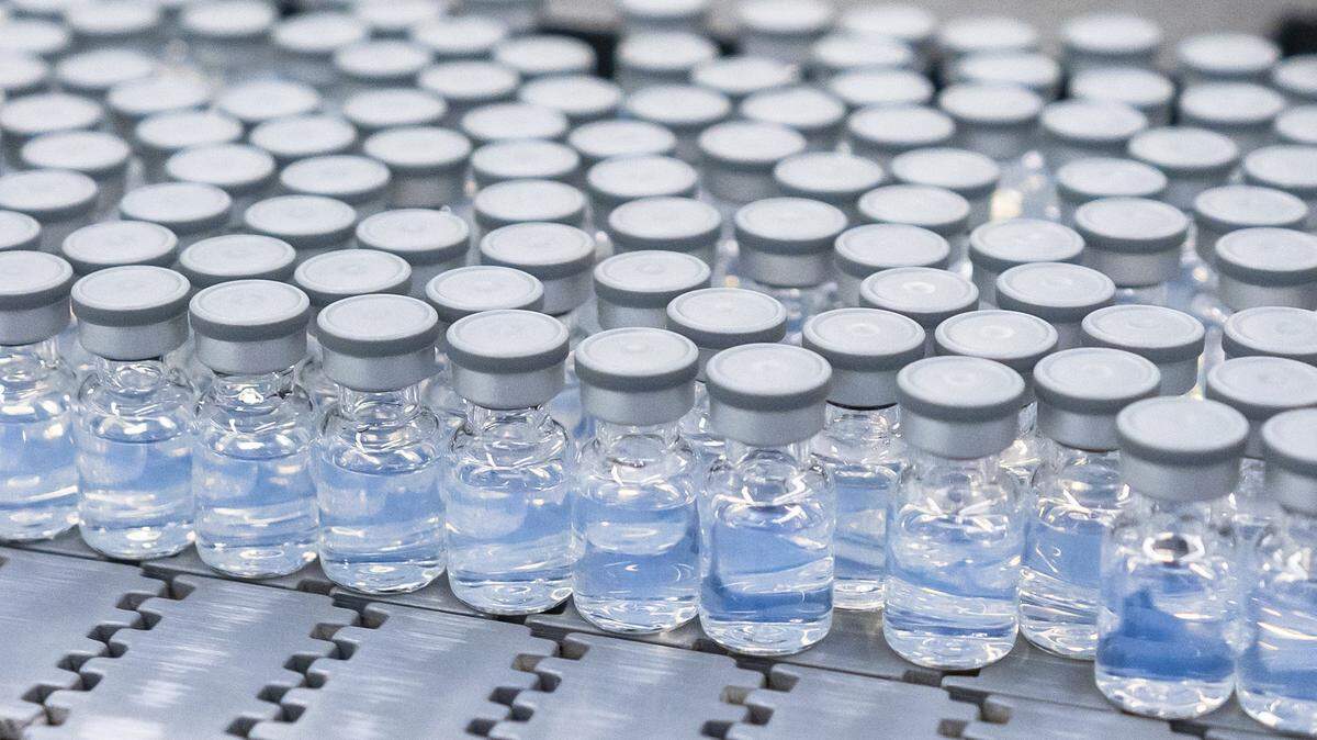 This August 2022 photo provided by Pfizer shows vials of the company’s updated COVID-19 vaccine during production in Kalamazoo, Mich.
