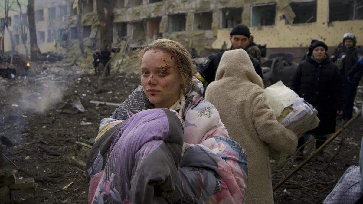 Mariana Vishegirskaya stands outside a maternity hospital that was damaged by Russian shelling in Mariupol, Ukraine on March 9. She later gave birth to a girl in another hospital in the city.