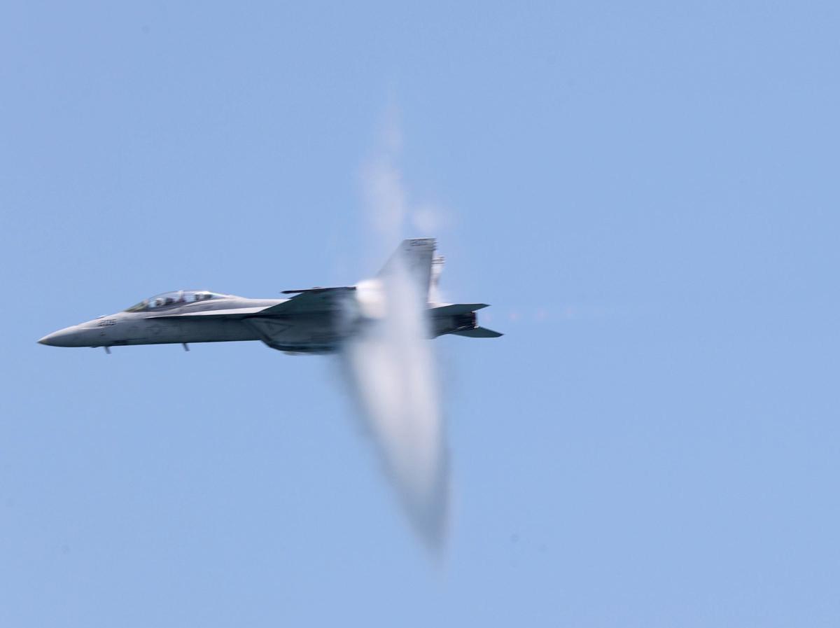 An F-18 Rhino flies over South Beach during the Hyundai Air & Sea Show 2023 in Miami Beach on Saturday, May 27, 2023.