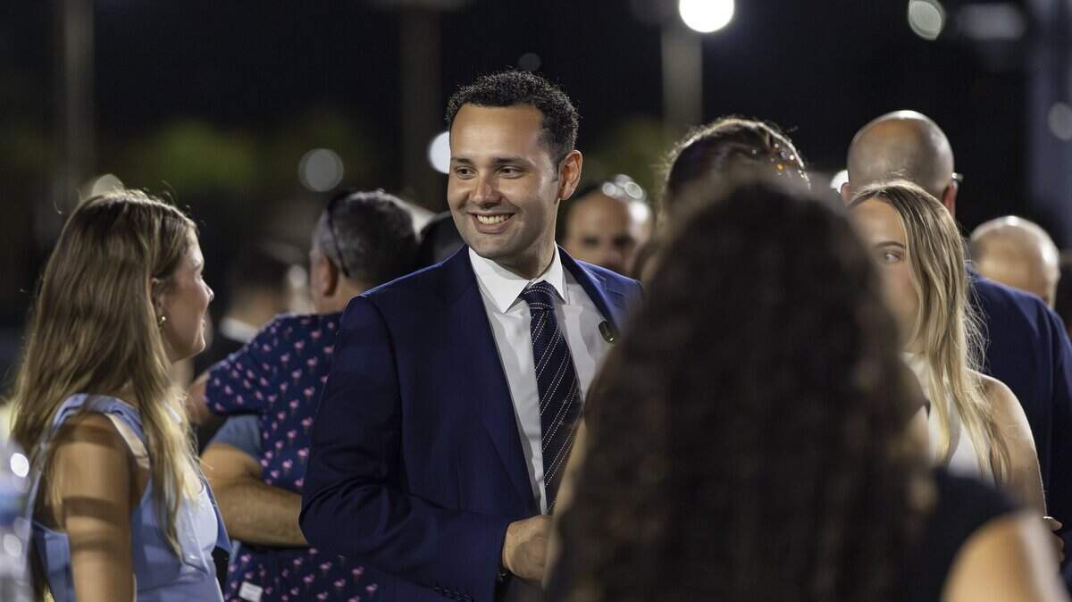 Hialeah Mayor Bryan Calvo, center, attends the Free Cuba Rally at Milander Park on Tuesday, March 24, 2026, in Hialeah, Fla. The demonstration, which was organized in part by the City of Hialeah, aims to bring together voices of the Cuban exile community in support of Cuba's freedom.