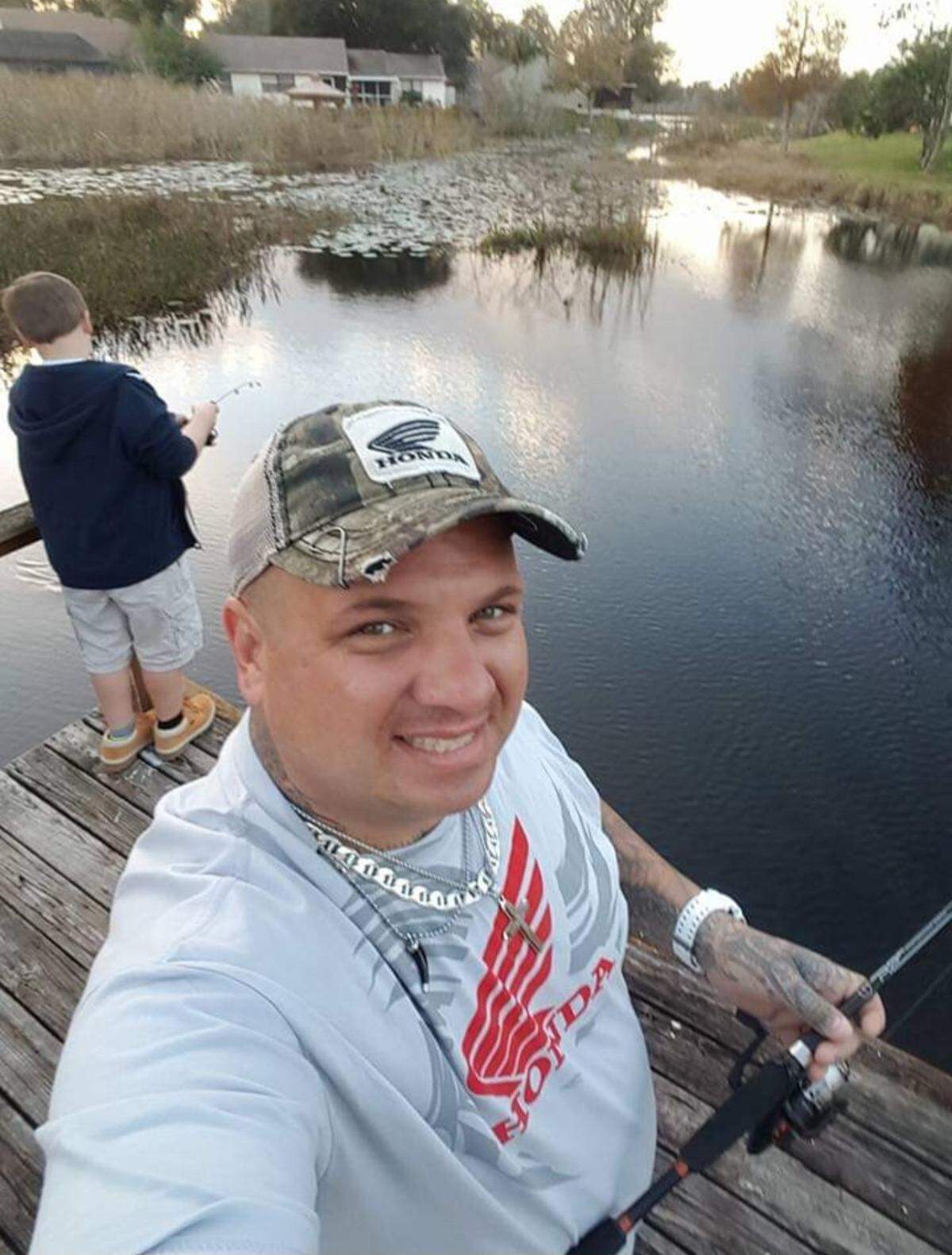 William Ritter on a fishing trip with his family